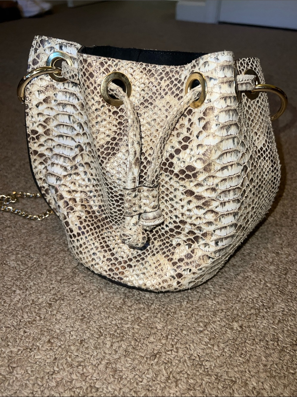 House of Harlow Neutral Snake-Print Drawstring Bucket Bag with Gold Hardware